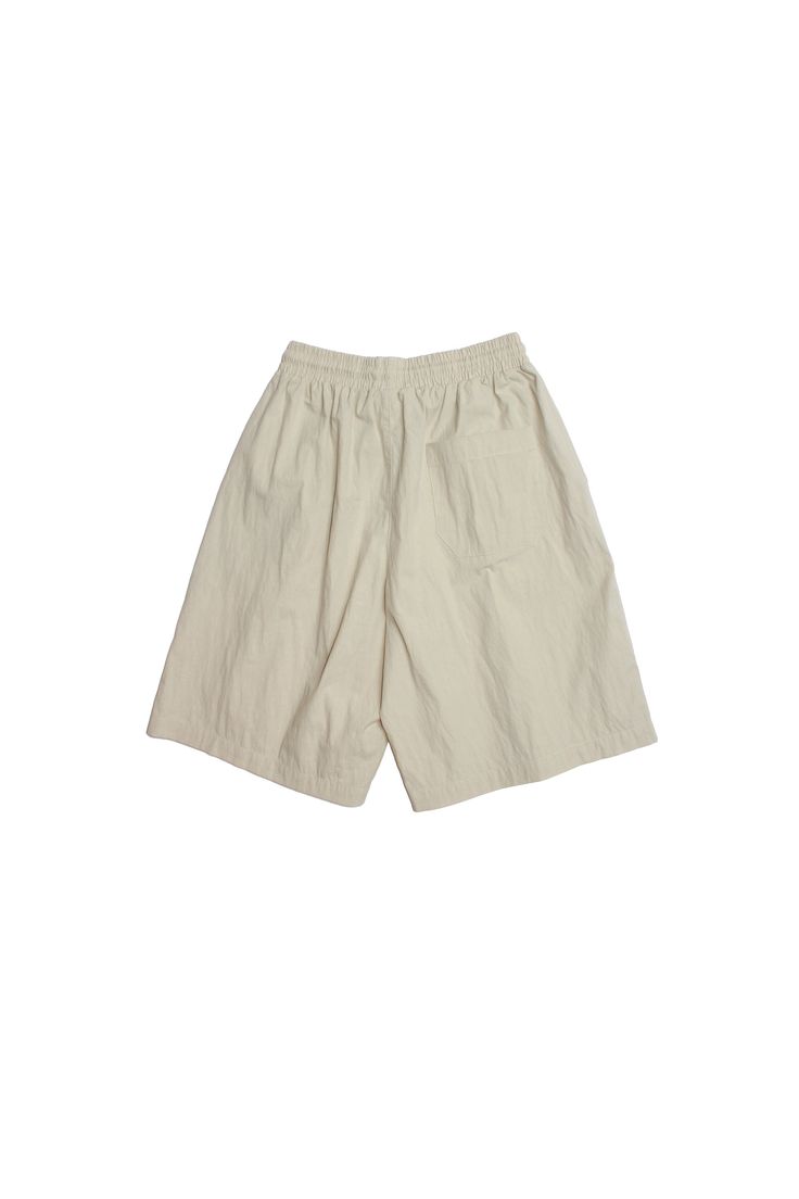 - Elastic waist with drawstring Side and back pockets Khaki Bermuda Shorts With Side Pockets For Summer, Beige Bermuda Bottoms For Vacation, Beige Bermuda Shorts For Beach, Beige Bermuda Bottoms With Built-in Shorts, Beige Bermuda Bottoms With Elastic Waistband, Beige Relaxed Fit Shorts With Elastic Waistband, Beige Bermuda Bottoms With Side Pockets, Beige Bermuda Shorts With Side Pockets, Beige Bermuda Shorts With Pockets