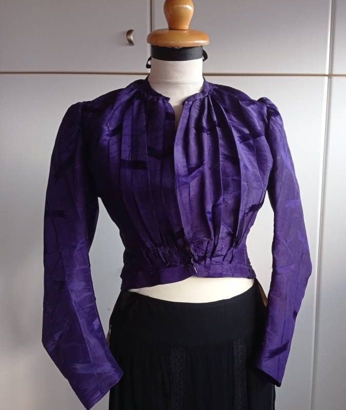 Purple victorian top, authentic. Collectible, museum item in an excellent condition considering its 'age'.  The garment was dry-cleaned and I have posted photos of it's inside so you can see the condition. Hand made. Satin silk fabric in a bright purple colour. Very waisted. The size is small (EU 34-36). Victorian Purple, Victorian Top, Womens Blouses, Purple Colour, Bright Purple, Purple Top, Satin Silk, Silk Satin, Silk Fabric