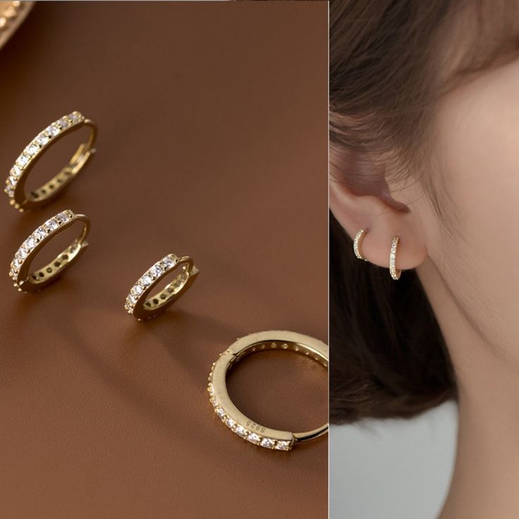 Classic and timeless handcrafted pave diamond huggie earring set in 14k gold plated. Minimal jewelry for everyday. Perfect for daily wear,party,wedding,anniversary,Mother's day,Thanks giving,Christmas,etc About item:  Material: High Quality Solid 925 Sterling Silver，Zircon  Finish: Sterling Silver，Gold Earring sizes / 10 mm, 12 mm，14mm or 16mm Location: Cartilage, Earlobe Package : Free Packaging P R O D U C T I O N ∙ T I M E S * All items are custom made to order. Our production time is about 1-3 business days. S H I P P I N G ∙ T I M E S * Shipping takes is about 7-10 business days on average in US / EU / Asian countries * Other countries usually takes is about 7-20 business days. * If you need it sooner, Shipping upgrades available in the cart Natural jade characteristics and other fact Gift Cubic Zirconia Tarnish-resistant Hoop Earrings, Tarnish Resistant Cubic Zirconia Hoop Earrings As Gift, Stackable Small Hoop Jewelry Gift, Minimalist Small Hoop Cartilage Earrings In Cubic Zirconia, Fine Jewelry Stackable Earrings As Gift, Small Hoop Cartilage Earrings As Gift, Fine Jewelry Stackable Earrings For Gift, Fine Jewelry Adjustable Hoop Earrings, Hoop Earrings As Gift For Her