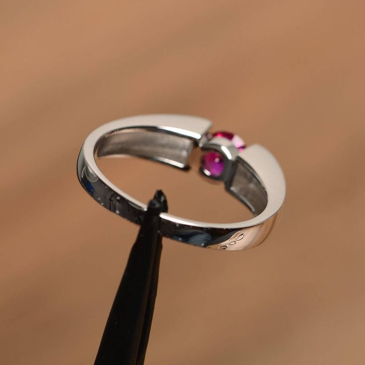 It is a lab ruby ring. The main stone is 5 mm*5 mm round cut.weight about 0.62 carats The basic metal is sterling silver and plated with rhodium. To change the metal to a solid gold (white/rose) or platinum is also available, please ask for a quotation if you want. You can also go to my shop Home for more elegant rings: https://www.etsy.com/shop/godjewelry?ref=hdr_shop_menu Ruby is July birthstone More ruby rings: https://www.etsy.com/shop/godjewelry?ref=seller-platform-mcnav&section_id=2070 Adjustable Ruby Promise Ring, Ruby Birthstone Promise Ring, Ruby Birthstone Ring With Polished Finish, Ruby Birthstone Promise Ring Round Cut, Silver Ruby Ring In 14k White Gold As Gift, 14k White Gold Ruby Ring As Gift, Fine Jewelry Ruby Ring With Polished Finish For Promise, Lab-created Ruby Promise Ring With Round Band, Cubic Zirconia Ruby Promise Ring