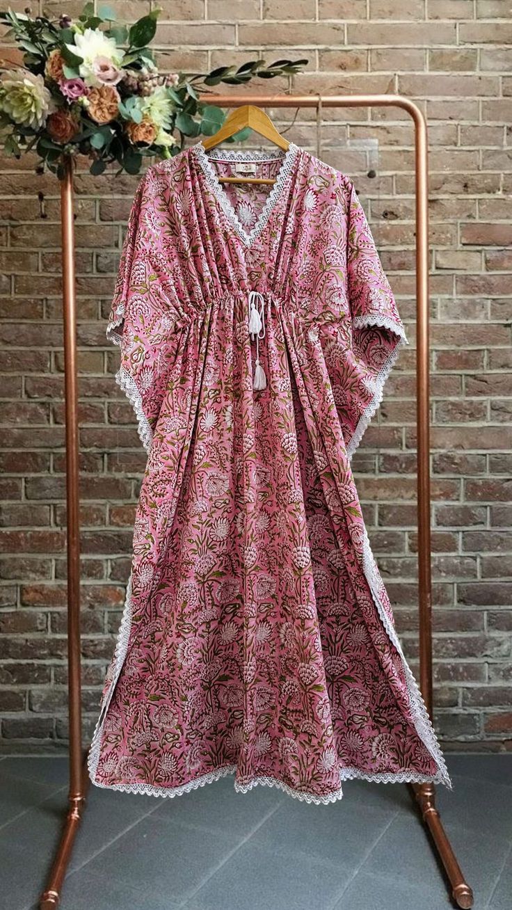 Pink printed kaftan, hand block print kaftan, beachwear, women's dress, cover ups, cotton kaftan, hippie dress, bikini cover up, women nightwear, holiday wear, bohemian dress, boho kaftan, vintage kaftan, kaftan maxi, dress for her, gift for mom, gift for girlfriend, beachwear cover-ups, comfy kaftan, printed kaftan, womens kaftan   Feel beautiful and confident throughout your days wearing our block printed outfits, made with high quality soft and breathable cotton fabric.  The print on the dres Bohemian Beach Dresses With Printed Motifs, Vacation Dresses With Printed Motifs, Cotton Boho Print Dress For Beach, Cotton Tunic Kaftan For Beachwear, Summer Dresses With Printed Motifs And Kimono Sleeves, Pink Beach Dress With Printed Motifs, Bohemian Block Print Kaftan For Beach Cover-up, Bohemian Block Print Kaftan For Loungewear, Bohemian Block Print Kaftan For Beach