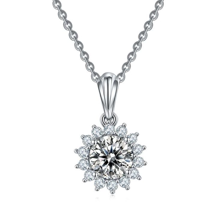 With a round moissanite at the core and a halo encircling it, this moissanite pendant necklace is a glittering marvel. It gives off the illusion of a sparkling star and looks extravagantly elegant. Features Moissanite was originally found in meteorites(Chemical name: Silicon Carbide). It was first discovered in 1893, while a scientist was examining meteor samples from a crater in Arizona. After many years, the experts has been recreated moissanite in the laboratory, that make the gemstone with f Moissanite Necklace With Halo Design In Diamond White, Moissanite Round Pendant Necklace With Halo Setting, Moissanite Necklace With Round Pendant And Halo Design, Moissanite Pendant Necklace With Halo Design, Dazzling Solitaire Necklace With Halo Pendant, Dazzling Moissanite Halo Diamond Necklace, Dazzling Moissanite Diamond Round Pendant Necklace, Dazzling Moissanite Diamond Necklace With Round Pendant, Moissanite Pendant