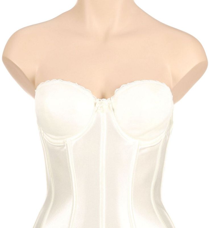 This low-back longline bustier bra is the best solution for the full-figure bride looking for a perfect hourglass figure on her big day. Non-stretch satin panels help shape the tummy with firm control. Comes with removable clear straps and garters. Underwire cups have light padding and hidden boning. Sleek, seamless, underwire cups are invisible under clothing. Boning in the bodice shapes the tummy and supports the bust. Super low back makes this bustier easy to wear with most backless gowns. Co Fitted Corset With Built-in Bra And Sweetheart Neckline, Fitted Full Coverage Corset With Built-in Bra, Sweetheart Neckline Corset With Built-in Bra, Elegant Push-up Corset With Built-in Bra, Elegant Corset Dress With Built-in Underwire Bra, Fitted White Underbust Shapewear, Elegant Shapewear With Sweetheart Neckline, Fitted Strapless Bra With Boned Bodice, Elegant Corset With Underwire And Corset Back