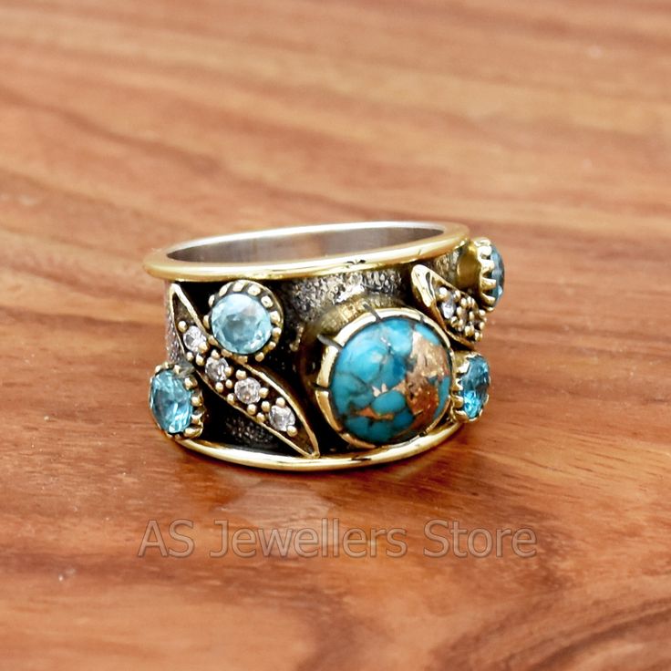 Blue Copper Turquoise Ring, Blue Topaz & Cubic Zirconia Ring, Wedding Ring, Two Tone Ring, Handmade Ring, 925 Sterling Silver Ring Metal : Sterling Silver  Stone : Blue Copper Turquoise Base Metal : 925 parts Per 1000  Style : Ring Turquoise Sapphire Gemstone Ring For Anniversary, Turquoise Sapphire Ring With Accent Stones For Anniversary, Turquoise Sapphire Anniversary Ring With Accent Stones, Turquoise Blue Topaz Rings Fine Jewelry, Adjustable Blue Ring With Gemstone Accents, Turquoise Blue Topaz Gemstone Rings, Turquoise Blue Topaz Ring, Turquoise Aquamarine Gemstone Rings, Blue Stone Fine Jewelry Rings