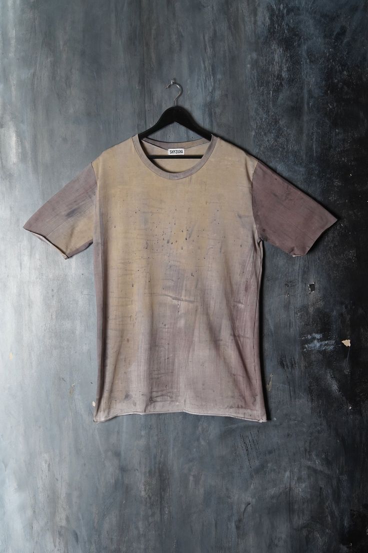 Naturally dyed cotton top. Loose fit dystopian long t-shirt. Seamless sleeves and bottom. Fabric is hand dyed using organic plant matter. Each piece is dyed individually and no two can ever be the same. One size Measurements: Chest: 120 cm / 47.2'' Waist: 114 cm / 44.9'' Shoulders: 56 cm / 22'' Sleeve: 30 cm / 11.8'' Length: 86 cm / 33.8'' One of the kind top! #127 Faded Pre-washed Cotton T-shirt, Acid Wash Cotton T-shirt With Natural Dye, Short Sleeve Cotton T-shirt With Natural Dye, Washed Black Bleached Crew Neck T-shirt, Hand Dyed Washed Black Crew Neck Top, Hand Dyed Washed Black Crew Neck T-shirt, Hand Dyed Crew Neck T-shirt For Streetwear, Grunge Acid Wash Pre-washed Top, Acid Wash Pre-washed Grunge Tops