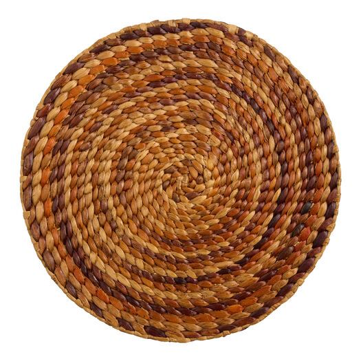 a round woven placemat with brown and tan colors on it, isolated against a white background