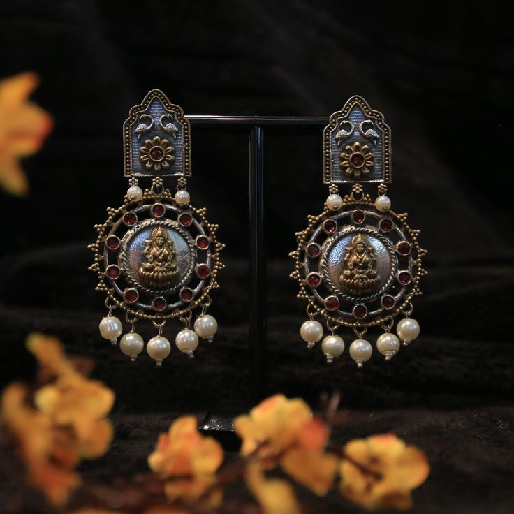 The unique dual-tone design adds a touch of elegance, while the oxidized finish gives them a rustic charm. Perfect for adding a touch of divinity to any outfit. Embrace this  Oxidized Dual Tone Earring with a stunning embossment and two-tone design, these earrings are a true statement piece. Organza Sarees, Tussar Silk Saree, Finger Rings, Accessories Jewelry Earrings, Rustic Charm, Statement Pieces, Jewelry Sets, Jewelry Earrings Dangle, Two Tone