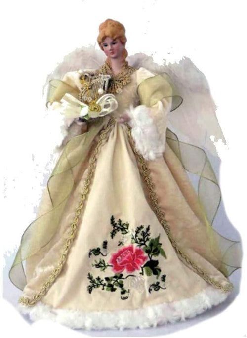 an angel figurine holding a bouquet of flowers and wearing a white dress with gold trimmings