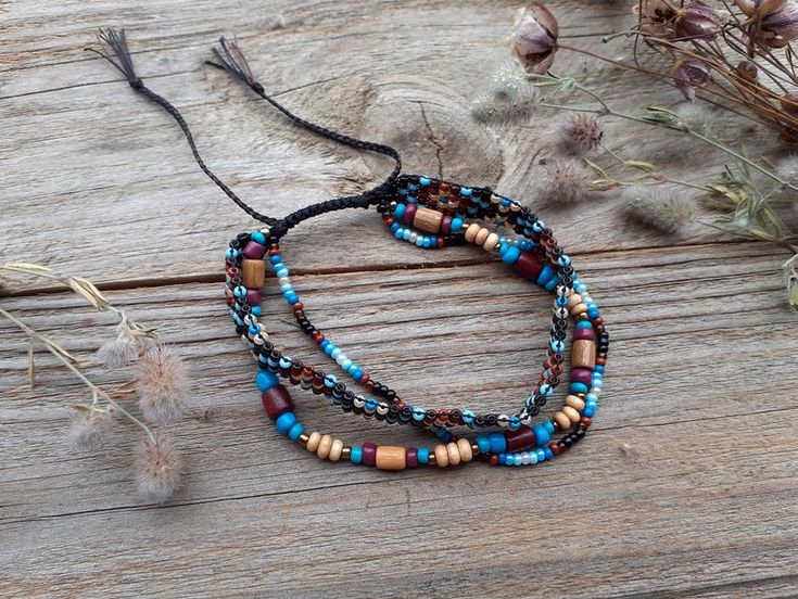 Hand woven boho bracelet for women or girl Beaded loom | Etsy Bohemian Wrap Bracelet With Tiny Beads As A Gift, Bohemian Wrap Bracelet With Tiny Beads Gift, Bohemian Blue Beaded Bracelets With Wooden Beads, Blue Bohemian Beaded Bracelets With Wooden Beads, Handmade Multi-strand Beach Bracelets, Bohemian Round Beads Friendship Bracelets For Festivals, Bohemian Tiny Beads Friendship Bracelets For Festivals, Hippie Braided Bracelets With Round Beads For Festivals, Bohemian Braided Bracelets With Tiny Beads For Beach