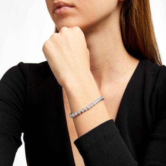 Wrap your wrist in the timeless sophistication of this diamond cushion-shaped link bracelet in sterling silver. Fashioned in sterling silver Each round diamond shimmers in a beaded cushion-shaped frame - all wrapped in an artful setting that enhances size and sparkle. Captivating with 1/2 ct. t.w. of diamonds This 7.25-inch bracelet secures with a box clasp. Black Friday Specials, Box Clasp, Bracelet Clasps, Diamond Stone, Stone Settings, How To Take Photos, Sterling Silver Bracelets, Link Bracelets, Round Diamond