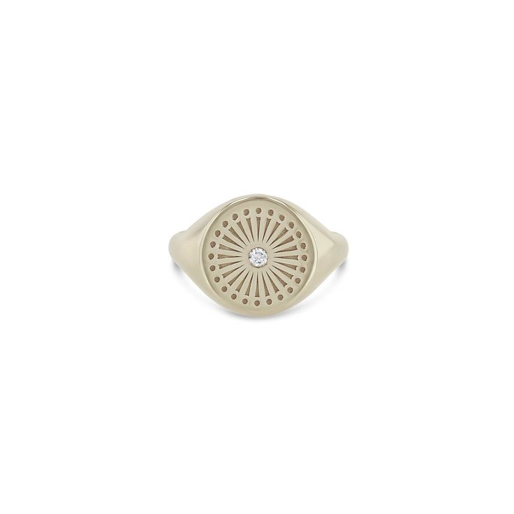 14k gold round signet ring engraved with a sunbeam and a single bezel set round diamond in the center of the ringSPECIFICS • face of ring is approx. 12mm in diameter• white diamond .03 ctw***Need a size not listed? Please email direct@zoechicco.com to submit your request, and we'll do our best to accommodate. We recommend you visit your local jeweler to get a professional measurement or order our complimentary ring sizer (US residents only) to determine your correct size. Diamond Bezel Setting Signet Ring, Timeless Bezel-set Signet Ring, 14k Gold Signet Ring With Single Diamond, Timeless Round Signet Ring With Single Diamond, Luxury Signet Ring With Center Stone, Luxury Engraved Ring With Single Diamond, Tarnish Resistant White Gold Diamond Ring, Luxury Round Signet Ring With Bezel Setting, White Gold Diamond Signet Ring, Tarnish Resistant