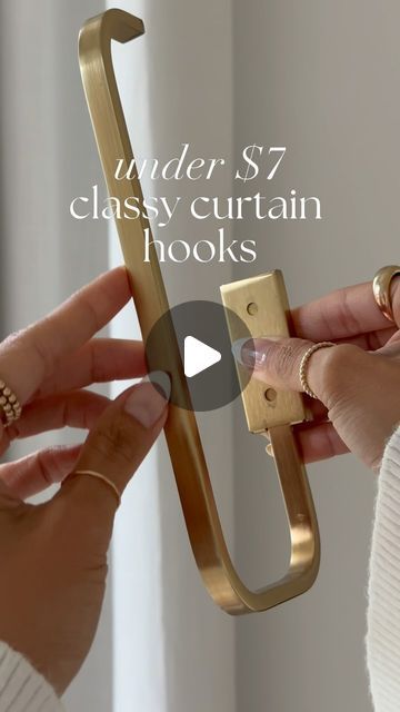 two hands are holding a pair of scissors in each other's hand and the text under it reads, 7 classy curtain hooks