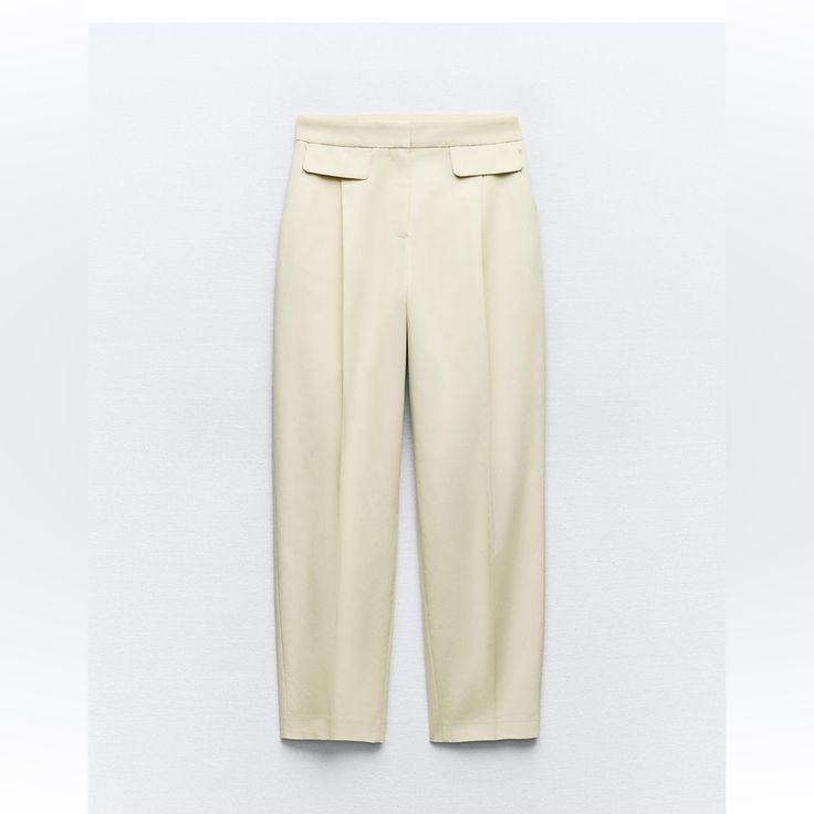 Zara Pants With A High Waist And Front Flaps Front Zip, Inside Button With Metal Hook Closure Beige Office Bottoms With Pockets, High Waist Office Pantsuit With Pockets, Cream Straight Pants With Belt Loops, Beige Summer Pants With Buttons, Summer Beige Pants With Buttons, High Waist Beige Pants With Welt Pockets, Beige High Waist Wide Leg Pants With Button Closure, High-waist Beige Bottoms With Buttons, High Waist Beige Bottoms With Buttons