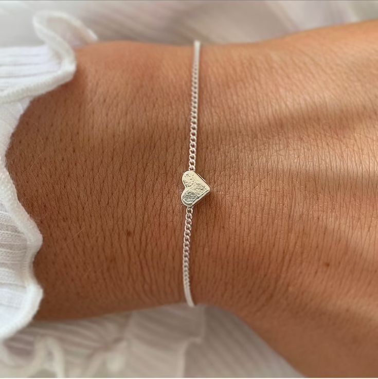 Silver heart bracelet Dainty charm bracelet Heart bracelets | Etsy Cute Silver Bracelets With Heart Charm, Simple Everyday Heart Bracelet, Dainty Heart Bracelets For Everyday, White Heart Bracelet For Everyday Wear, White Heart Bracelet For Everyday, Trendy Everyday Heart Bracelet For Valentine's Day, Everyday Heart Bracelet For Valentine's Day, Trendy Heart Charm Bracelet As Gift, Trendy Heart Charm Bracelet Gift