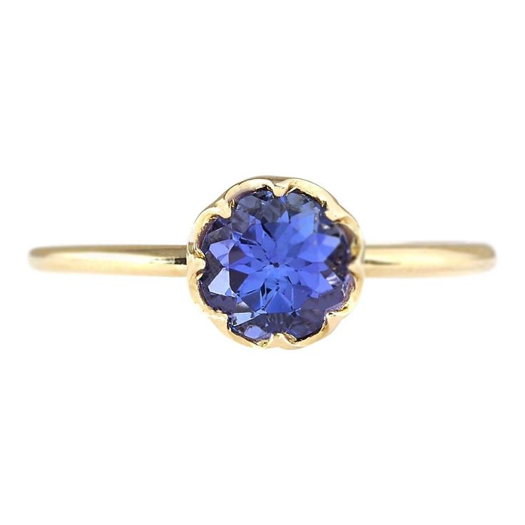 Stamped: 14K Yellow Gold Total Ring Weight: 1.7 Grams Total Natural Tanzanite Weight is 1.35 Carat Color: Blue Face Measures: 7.00x7.00 mm Sku: [703246W] Blue Face, Tanzanite Ring, La Face, Natural Tanzanite, Yellow Gold Ring, Ring Ring, Tanzania, Cocktail Rings, Yellow Gold Rings