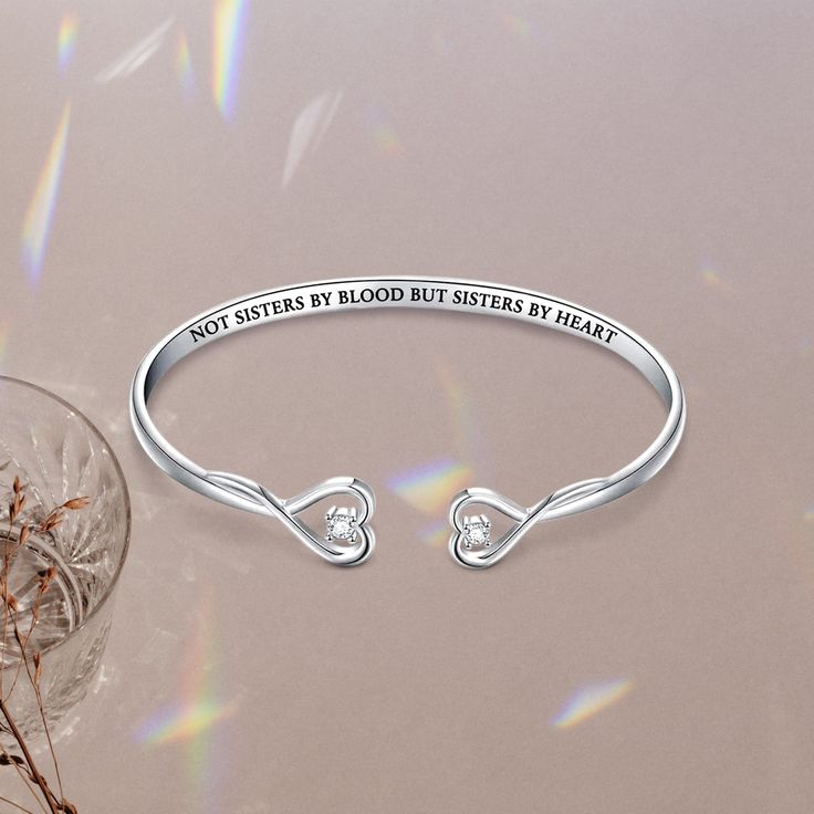 If you're looking for a beautiful and sentimental way to show your best friend some love, this bracelet is a perfect choice. The sleek, minimalist design is perfect for everyday wear, and the two delicate hearts represent you and your best friend, reminding you of all the good times you shared together. Whether you wear it as a daily reminder of your special bond or give it to your best friend as a gift, this bracelet is sure to be cherished for years to come. Why buy from us?: Crafted in Solid Minimalist Stainless Steel Friendship Bracelets, Stainless Steel Heart Bracelet For Anniversary, Minimalist Heart Charm Jewelry For Best Friend Gift, Minimalist Heart Charm Jewelry For Best Friend, Minimalist Jewelry With Heart Charm For Best Friend Gift, Elegant Stainless Steel Bracelets For Valentine's Day, Meaningful Heart Bracelets For Mother's Day, Heart Shaped Jewelry For Best Friend, Meaningful Heart-shaped Bracelets For Mother's Day