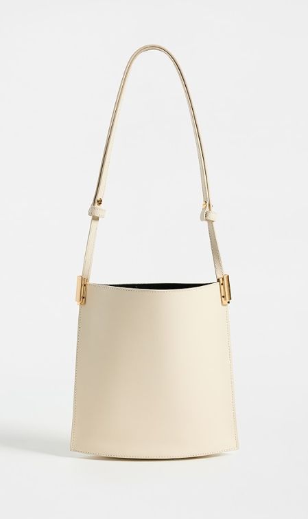 Find NEOUS Dorado 1.0 Shoulder Bag on Editorialist. Calfskin,Gold-tone hardware,Open top,Patch interior pocket,Suede lining,Weight: 10oz / 0.28kg,Made in Italy High-end Shoulder Bucket Bag With Gold-tone Hardware, Modern Shoulder Bag With Gold-tone Hardware, High-end Bucket Bag With Gold-tone Hardware And Top Handle, High-end Bucket Bag With Gold-tone Hardware, Modern Bucket Shoulder Bag With Brass Hardware, High-end Top Handle Bucket Bag With Gold-tone Hardware, High-end Beige Shoulder Bag With Gold-tone Hardware, Designer Bucket Bag With Gold-tone Hardware For Everyday, High-end Daily Use Bucket Bag With Gold-tone Hardware