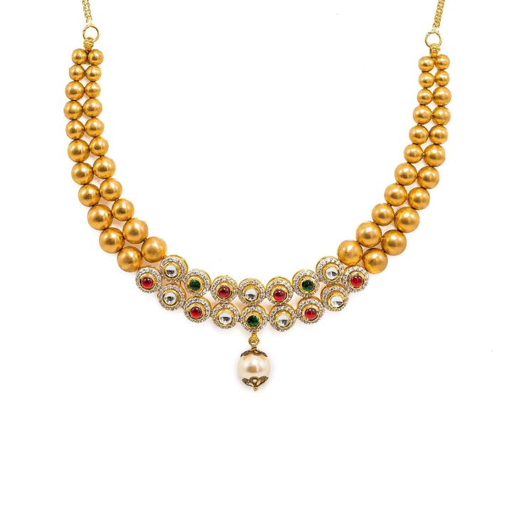 22K Yellow Gold Necklace And Earrings Set W/ Rubies, Emeralds, CZ Stone Jewelry, Pearls & Smooth Gold Balls for women. Make a statement at any affair with this dazzling 22K yellow gold necklace and earrings set embellished with precious rubies, emeralds, CZ gems and drop pearls. The design features a double stranded necklace of smooth gold balls. The necklace is 14 inches long with a width range of 2-16.5 mm wide. The pendant is 16.5 mm long and 10 mm wide. Each earring is 38 mm long and 17 mm w Gold Necklace With Round Ruby Beads, Yellow Gold Ruby Kundan Necklace Gift, Traditional 22k Gold Multi-stone Necklaces, Luxury Yellow Gold Ruby Necklace, Gold Necklace And Earrings Set, Gold Bollywood Multi-stone Necklace, 22k Gold Necklace, Jewelry Pearls, Yellow Gold Necklace