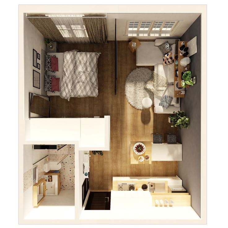 an overhead view of a bedroom and living room in a small apartment with wood flooring