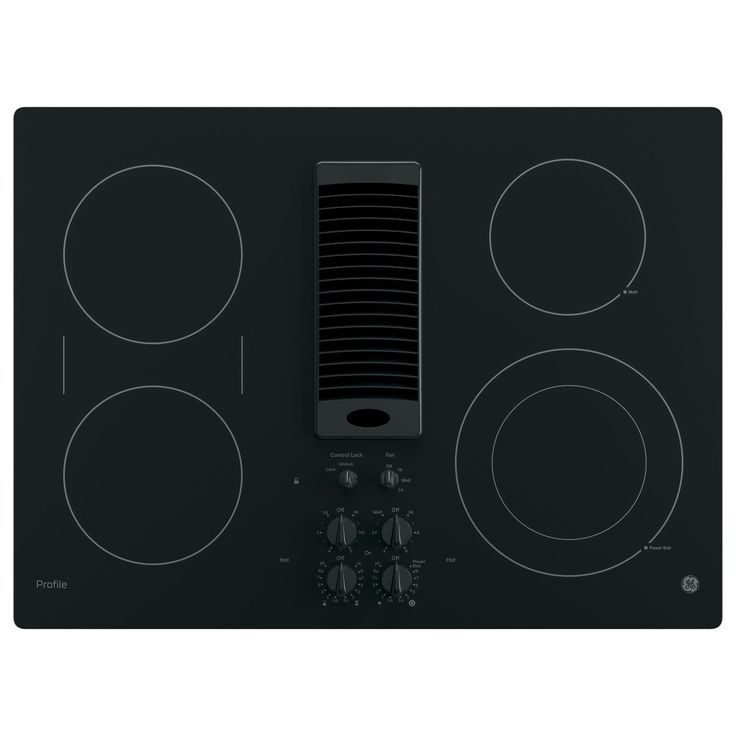 a black stove top with three burners and two knobs on the front side