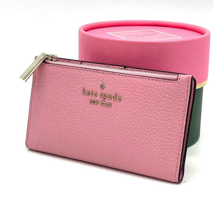 Brand New With Tag Kate Spade Leila Small Slim Bifold Wallet Product Details Color: Bright Carnation 3.1" H X 5.5" W X 0.9" D Pebbled Leather Ksny Metal Pinmount Logo Two Way Spade Jacquard Lining Interior: 5 Credit Card Slots, Id Window, 2 Slip Pockets Exterior: Top Zip Coin Compartment On Front Of Wallet Snap Closure Dust Bag Not Included Imported Chic Pink Wallet With Zipper Closure, Pink Feminine Wallet For Everyday Use, Compact Pink Coin Purse For Travel, Feminine Pink Wallet For Everyday Use, Feminine Pink Wallets For Daily Use, Pink Feminine Wallet For Everyday, Compact Pink Travel Coin Purse, Elegant Pink Compact Coin Purse, Elegant Pink Coin Purse For Daily Use