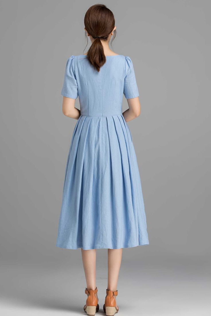 "This Prairie Linen dress can be styled with light weight a accessories for a daring ensemble . vintage inspired design, Handmade by Xiaolizi. DETAILS * 50% linen , 50% cotton blend * No lining * Seam pockets * Square Neckline * Back zip closure * Fit and flare dress, pleated dress * Below Knee Length * Summer, Spring * Wash by hand or machine with cold water, Ironing after dry * More color and More size https://etsy.me/2TGUAgq SIZE GUIDE Size vary between Brand and Country Please get your body Summer Vintage A-line Pleated Dress, Modest Light Blue Spring Dress, Light Blue Pleated A-line Dress, Modest Light Blue Summer Dress, Light Blue A-line Pleated Dress, Elegant Light Blue Puff Sleeve Dress For Spring, Modest Fitted Puff Sleeve Summer Dress, Elegant Light Blue Puff Sleeve Summer Dress, Elegant Light Blue Cotton Dress