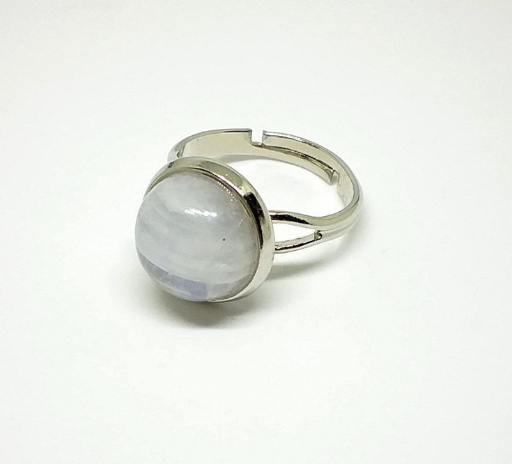 Moonstone ring inspired from Twilight movie! It is a perfect final touch for your Bella Swan look!   - the ring is adjustable - made from metal - the stone is a real pure Moonstone stone! Adjustable Moonstone Crystal Ring With Open Design, Adjustable White Moonstone Ring, Adjustable Round Moonstone Ring, Adjustable Round Moonstone Ring Gift, Adjustable Moonstone Ring As Gift, Adjustable Silver Moonstone Crystal Ring, White Adjustable Moonstone Ring As Gift, Adjustable White Moonstone Ring As Gift, Adjustable Silver Moon-shaped Moonstone Ring