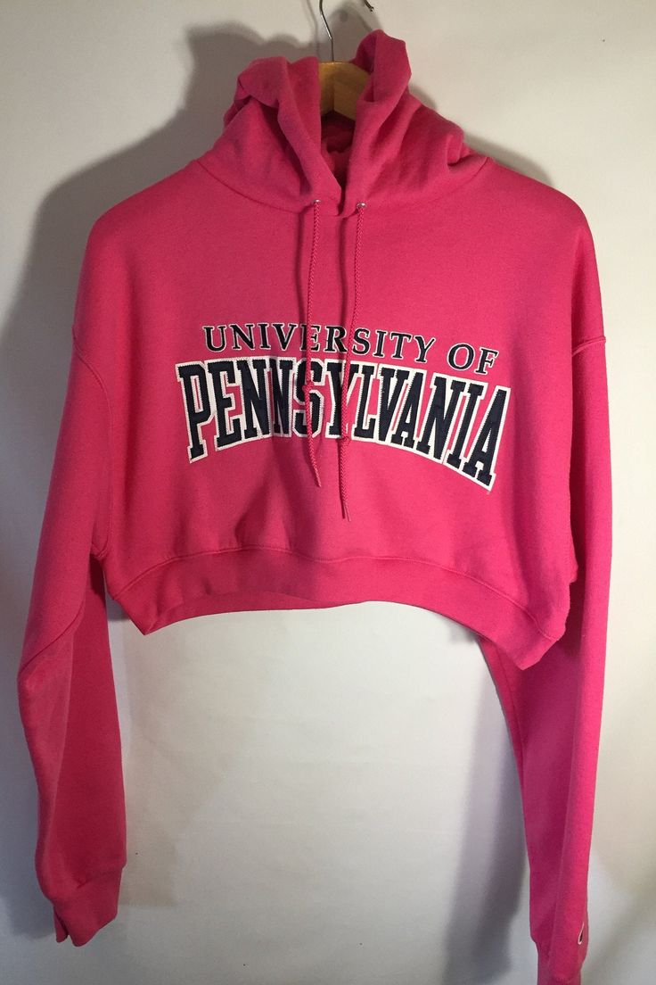 University of Pennsylvania Cropped Hoodie Spring Fitted Hoodie With Letter Print, Cotton Hoodie For College In Fall, Spring Fleece Stretch Hoodie, Fall Fan Apparel Hoodie With Adjustable Hood, Collegiate Fall Sweatshirt With Drawstring Hood, Spring College Sweatshirt With Drawstring Hood, Fitted Cotton Hoodie With Letter Print, Fitted Letter Print Sweatshirt For Spring, Fall College Style Hoodie