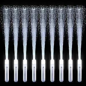 six toothbrushes are lined up against a black background with white sparkles on them