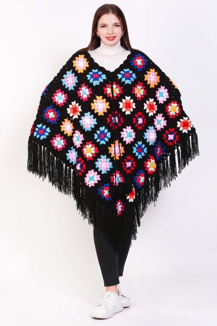 A crochet shawl for women that embodies boho charm and style, this lightweight sweater is a versatile and fashionable piece for any wardrobe. Handcrafted with intricate crochet work, it features a loose and flowy fit that drapes elegantly over the shoulders, creating a relaxed and effortless look. Perfect for layering over a simple top or dress, this boho poncho adds a touch of bohemian flair to any outfit. Whether styled with jeans for a casual day out or paired with a maxi skirt for a bohemian