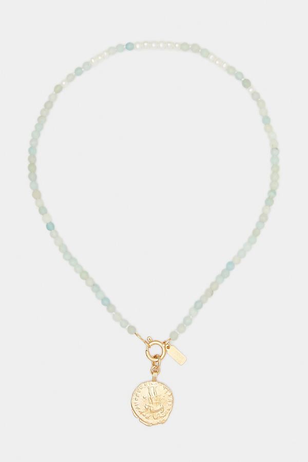 Please note that all sales are final. Our handcrafted necklace was beaded by hand with genuine Amazonite stones and can be worn with or without the removable charm medallion. It’s reversible, so you can wear the pearls on the front, or choose to display the golden detail and medallion. Our medallion was crafted from a 2000-year-old Roman coin, to which we added modern feminist portraits; our Sophia Charm. Genuine Amazonite and 14k Gold Vermeil Wipe clean Handcrafted with love in Montreal Dimensions 16 inch | Fairymoss Reversible Necklace by Deux Lions Jewelry in Gold, Women's at Anthropologie 2000 Year, Green Stone Necklace, Lion Necklace, Amazonite Stone, Vermeil Jewelry, Handcrafted Necklace, Accessories Jewelry Necklace, Women Accessories Jewelry, Stone Necklace