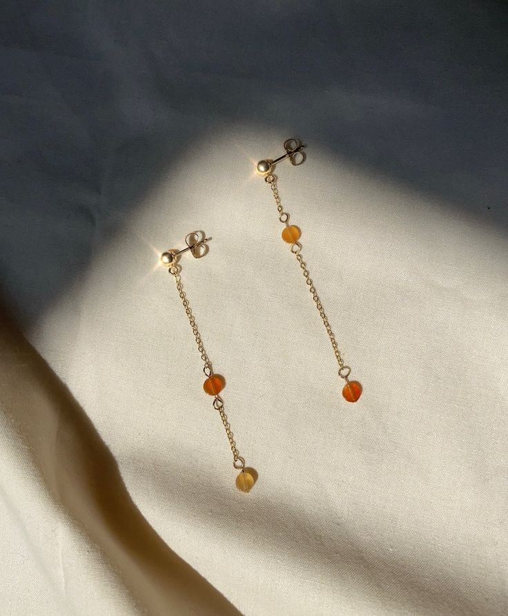 Harvest Earrings feature delicate hand made chain with an array of carnelian gemstones. Carnelian is known to promote creativity and naturally comes in a variety of hues such as red, orange and yellow. In collaboration with The Bowery Mission, the Harvest Set was designed for a good cause; to provide meals for homeless neighbors in need. For every sale, 10% will be donated to The Bowery Mission, providing 6+ meals. The Bowery Mission is an historic NYC nonprofit that has been helping those exper Harvest Earrings, Meals For Homeless, Silver Jewelry Design, The Harvest, Good Cause, Orange And Yellow, Modern Jewelry, Delicate Bracelet, Chain Link