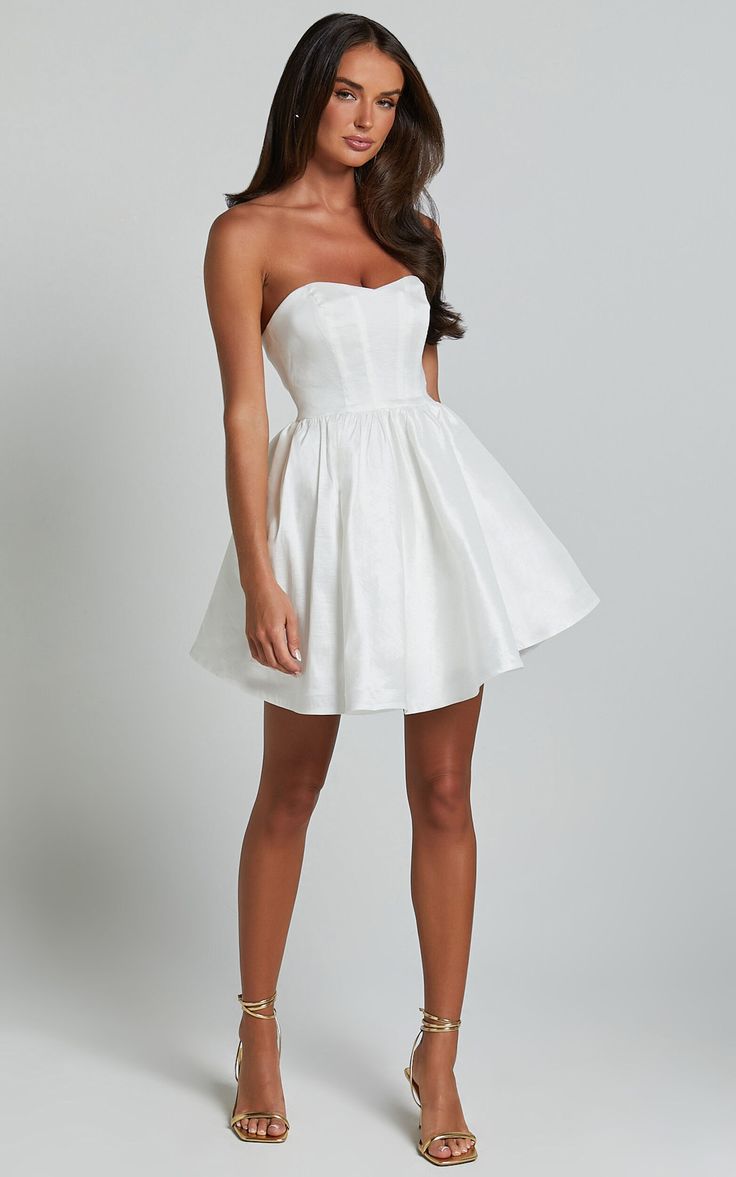 Jayde Mini Dress - Strapless Sweetheart Fit And Flare Dress in White White Fit And Flare Dress Short, Elegant A-line Corset Dress For Homecoming, Heart-shaped Neckline Mini Dress With Corset Back For Wedding, Fitted A-line Strapless Dress For Wedding, Strapless A-line Dress With Ruched Bodice For Wedding, Short White Dress Wedding Receptions, Summer A-line Corset Dress For Prom, Evening Fit And Flare Corset Dress With Sweetheart Neckline, Fitted Strapless Mini Dress For Bridesmaid