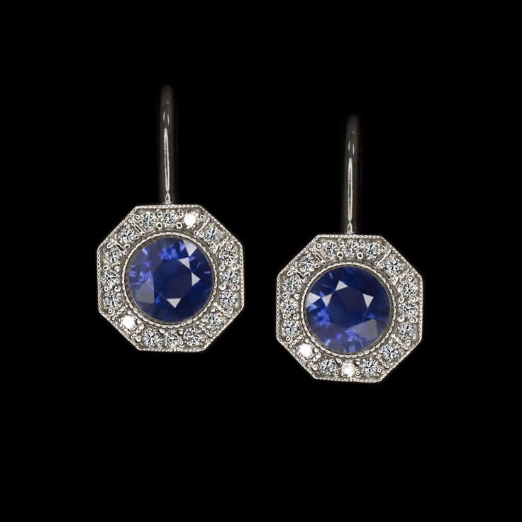 These gorgeous vintage inspired diamond and sapphire earrings are beautifully designed to capture the glamour and romantic style of vintage design! The rich blue sapphire centers are perfectly set off by the bright white accent diamonds. Finished with fine milgrain details, the octagonal halos gi... Exquisite Blue Jewelry With Single Cut Diamonds, Classic Blue Platinum Earrings, Elegant Blue Platinum Earrings, Luxury Platinum Blue Earrings, Blue Platinum Jewelry With Single Cut Diamonds, Luxury Blue Platinum Earrings, Platinum Jewelry With Blue Single Cut Diamonds, Blue Single Cut Diamond Jewelry In Platinum, Formal Sapphire Jewelry With Single Cut Diamonds