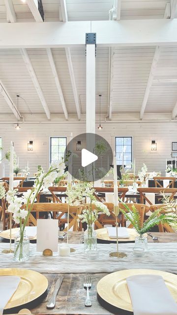 a table with plates and flowers on it