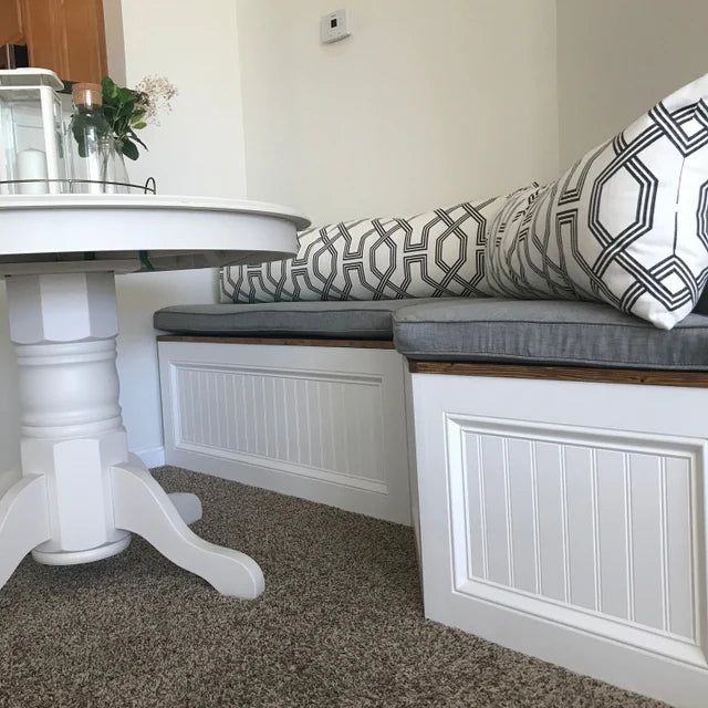 Photo of a custom angled banquette bench with a cushion on top Bench Kitchen Seating, Bench Breakfast Nook, Banquette Corner, Kitchen Nook Bench, Coin Banquette, Custom Banquette, Economics 101, L Shaped Bench, Corner Bench Seating