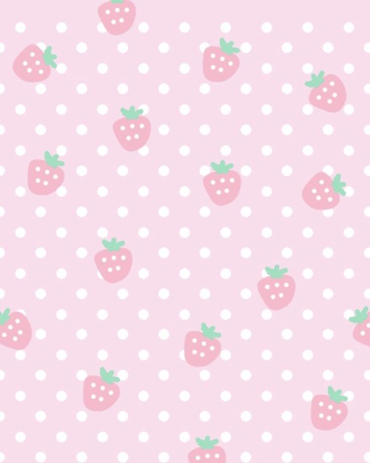 a pink wallpaper with white polka dots and strawberries on the bottom right corner