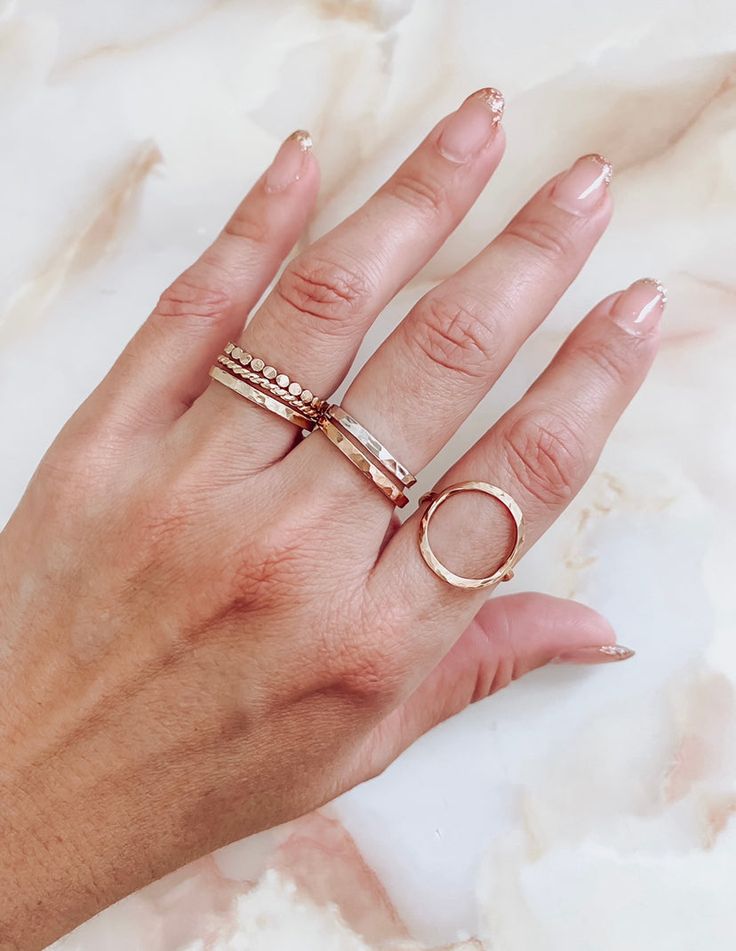 Our Karma Circle Ring is completely handmade. It is made of 14K gold-filled, rose gold-filled, or sterling silver and has been full hammered to give a spectacular sparkle and unique style. Circle Means: The circle is a universal symbol with extensive meaning. It represents the notions of totality, wholeness, original perfection, the Self, the infinite, eternity, timelessness, all cyclic movement, God ('God is a circle whose centre is everywhere and whose circumference is nowhere') Material sterl Circle Ring, Necklace Sizes, Ring Necklace, Gold Ring, Gold Filled, Sterling Silver Rings, Silver Gold, Unique Style, Gold Rings