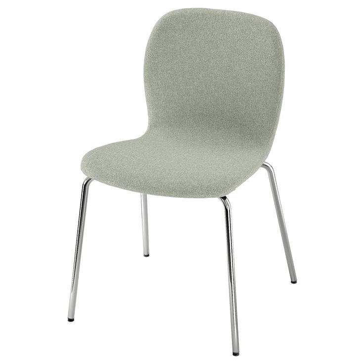 a light green chair with metal legs and a white back ground, viewed from the front