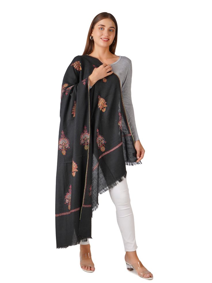 Wrap yourself in sophistication with our Stylish Black Pashmina Shawl, featuring elegant embroidery that adds a touch of luxury to any outfit. Crafted from the finest pashmina, this shawl offers unparalleled softness and warmth, making it an essential accessory for every occasion. Product Details: Hand Embroidered Kashmiri Pashmina Shawl Material: Pure Pashmina (100% Cashmere) Size: 100 cm X 203 cm / 40 Inch X 80 Inch / 1.1 x 2.2 Yards (Approx) Color: Black with intricate embroidery Embroidery: Elegant Black Dupatta For Winter, Black Pashmina Shawl For Festive Occasions, Black Festive Pashmina Shawl, Festive Black Pashmina Shawl With Embroidered Border, Traditional Black Scarves For Festive Occasions, Black Unstitched Embroidered Fabric With Border, Elegant Black Pashmina Shawl For Festive Occasions, Traditional Black Festive Scarves, Unstitched Black Embroidered Fabric With Embroidered Border