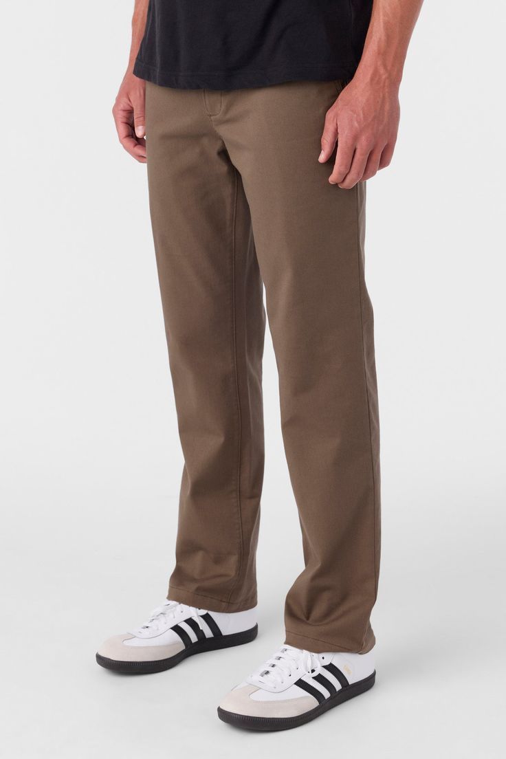 The perfect modern chino pant, built for everyday wear. It features a standard fit straight leg design, premium stretch fabrication and a light but durable feel. O'Neill Men's stretch chino pant 16" Leg opening 32" Inseam Regular fit, straight leg Back welt pockets with button closure Front slash pockets Buckle button front closure Chambray binding at interior waistband Back patch detail 98% Cotton, 2% Elastane Twill | O'Neill Men's Transporter Stretch Standard Pants in Chocolate Chip, Size 44, Suits Series, Wetsuit Men, Flannel Pants, Spring Suit, Sun Shirt, Stretch Chinos, Boys Top, Chinos Pants, Swim Trunks