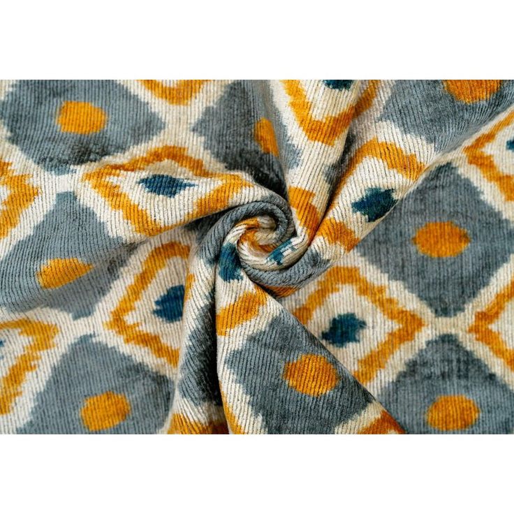 an orange and blue patterned fabric