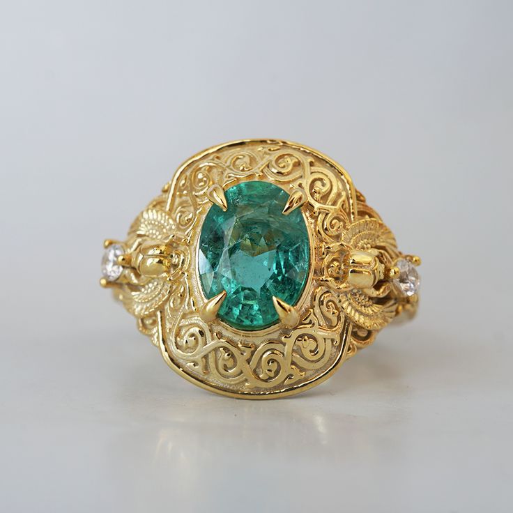 Introducing the "Emerald Scarab Ring" – a captivating blend of ancient Egyptian mystique and timeless elegance. Centered with a lush emerald framed by intricate Islamic patterns inspired by Egypt's architectural wonders, this ring evokes the opulence of ancient Egypt. Flanked by scarabs symbolizing rebirth, each holds a radiant diamond, echoing the sun's eternal sparkle on the Nile's waters. All orders come in our Tippy Taste ring box. This ring is handmade and designed in NYC. 14K or 18K solid Scarab Ring, Islamic Patterns, Radiant Diamond, Pretty Jewellery, Ancient Egyptian, Ring Box, Ancient Egypt, 18k Rose Gold, Precious Metals