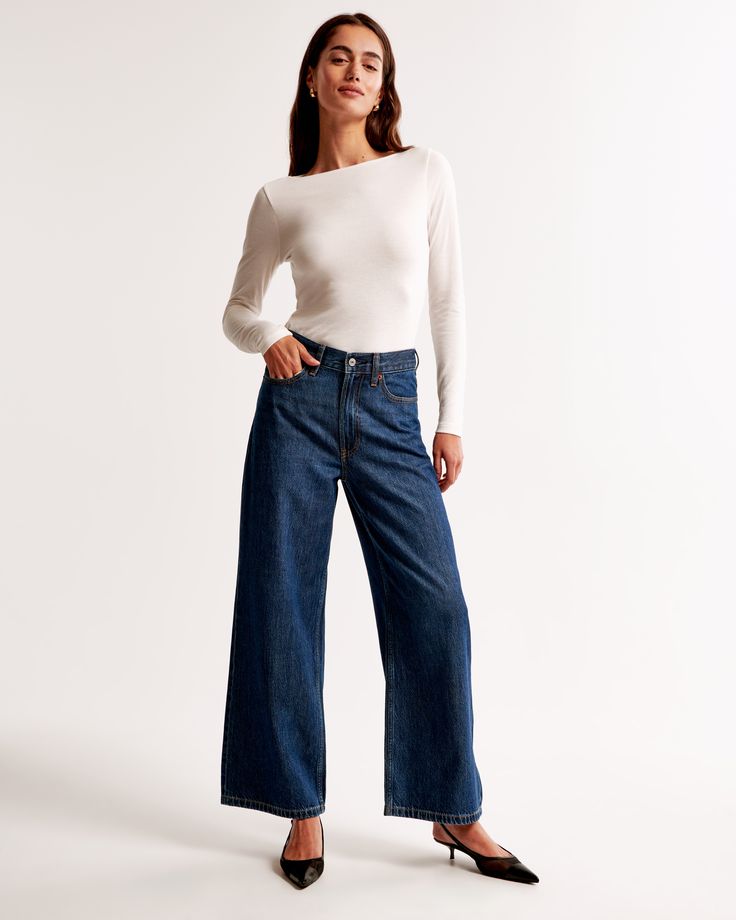 Elevate your wardrobe with the Abercrombie & Fitch Women's High Rise Cropped Wide Leg Jeans, a perfect blend of comfort and style. These jeans feature a sophisticated dark marble wash and a flattering high-rise design that accentuates your waist.

- Size: 28 LONG
- Color: Dark Marble
- Material: Cotton, TENCEL™ Lyocell
- Gender: Female
- Fit: High rise, 10.5” rise, relaxed at the waist and hips, wide and full-length leg shape with a cropped length

Crafted from a super soft, lightweight rigid de Dark Marble, Cropped Wide Leg Jeans, Denim Crafts, Women's Bottoms, Pocket Bag, Denim Fabric, Wide Leg Jeans, Waist Size, Women Crop