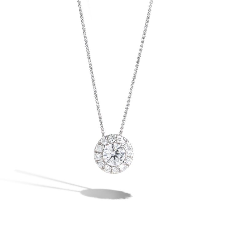 An elegant .25ct round cushion halo necklace showcasing .30ctw pave diamonds in the cushion halo. The pendant hangs on a beautiful 14K white gold dainty chain. Diamond Halo Necklace, Round Lab Grown Diamond Jewelry With Halo, Round Lab-grown Diamond Jewelry With Halo, Fine Jewelry With Brilliant Cut Lab Grown Diamonds, Lab Grown Diamond Halo Jewelry, Brilliant Cut Lab Grown Diamond Fine Jewelry, Halo Round Lab Grown Diamond Jewelry, Brilliant Cut Lab-grown Diamond Fine Jewelry, Timeless Jewelry With Lab Grown Diamond In Round Band