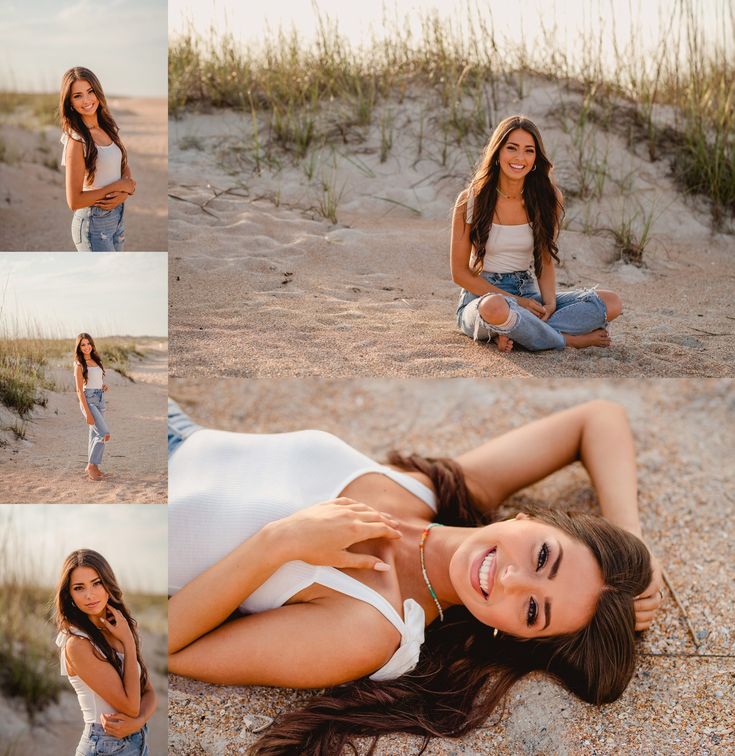 a beautiful young woman sitting on top of a sandy beach next to grass and sand dunes