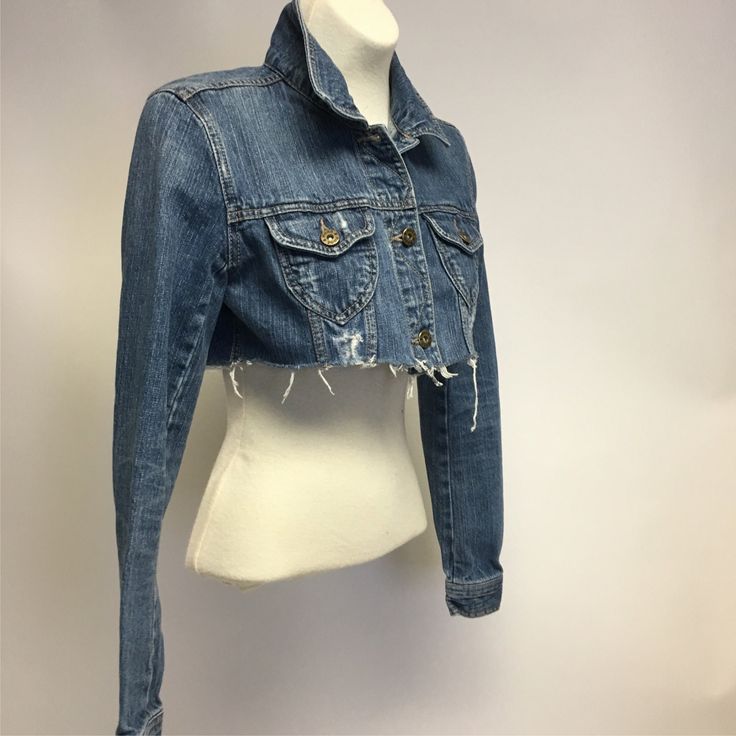 This, weathered vintage  denim jacket has been intentionally cropped and distressed.  Frayed hem.  Fits approx. a size XS/S.  Fudd  brand.  When buttoned up, the bust line measures 35 inches around.  It is 12 inches long from the top of the shoulder to the hemline.  The sleeves are 24 1inches long.   Find  handmade clothing & accessories at:  dinwiddies.etsy.com Find unique items for the home at:  dinwiddieshome.etsy.com www.dinwiddies.blogspot.com Medium Wash Cropped Jacket For Spring, Cropped Medium Wash Denim Vest For Fall, Dark Wash Cropped Jacket For Fall, Fitted Cropped Casual Jacket, Fitted Casual Cropped Jacket, Casual Fitted Cropped Jacket, Cropped Cotton Denim Top For Fall, Spring Cropped Jacket In Medium Wash, Fitted Washed Denim Jacket In Grunge Style