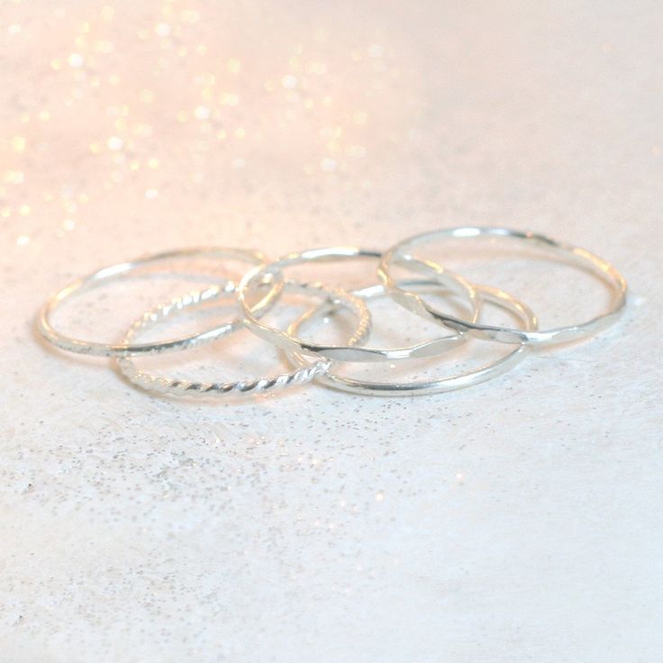 Minimalists rejoice over this dainty, sterling silver stacking ring. Smooth and shiny, made to order in your size! Any of our sterlings silver or gold stacking rings are just right for wearing alone, as a knuckle ring or as a set. This ring makes a lovely wedding band. This slim stacking band is also available in yellow gold or rose gold filled, or 14k solid yellow, rose or white gold (separate listings!). See additional links below for more metal options and ring styles. ►More stacking rings in Simple Open Stackable Rings, Stackable Dainty Midi Rings, Dainty Stackable Midi Rings With Round Band, Stackable Dainty Midi Rings With Round Band, Stackable Dainty Bands, Dainty Stackable Open Midi Rings, Minimalist Stackable Toe Rings, Dainty Everyday Stackable Toe Rings, Minimalist Tiny Stackable Toe Rings