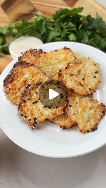 some food is on a white plate with parsley