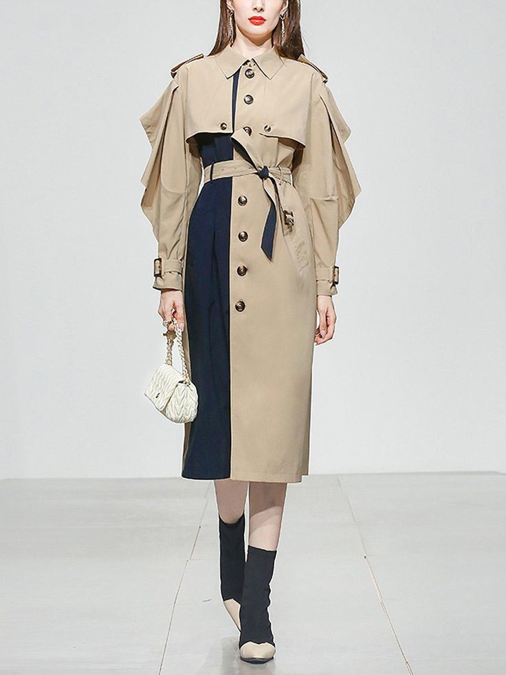 The trench coat is a stylish and practical outerwear piece that infuses new vitality into the traditional trench coat design. Featuring a trendy colorblock pattern, this coat stands out from the ordinary, making a bold fashion statement. Long sleeves with belted cuffs Ruffle hem Single-breasted button closure Spread collar Side-seam pockets Gun flap, storm flap Cotton, polyester Machine wash, tumble dry Women's trench coat Item #311071 Size info XS=US2=UK6=EU32 S=US4-6=UK8-10=EU34-36 M=US8-10=UK Light Trench Coat, Women's Trench Coat, Coat Belt, Trench Beige, Coat Stands, Classy Work Outfits, Belted Trench Coat, Ruffle Long Sleeve, Coat Patterns